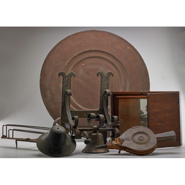 ASSORTED FURNISHINGS: Six pieces, 18th / 19th c.; Including mahogany campaign-style dressing mirror, leather bellows, two bronze bells (one mounted on wrought-iron bracket), circular advertising sign, etc.; Unmarked; Large