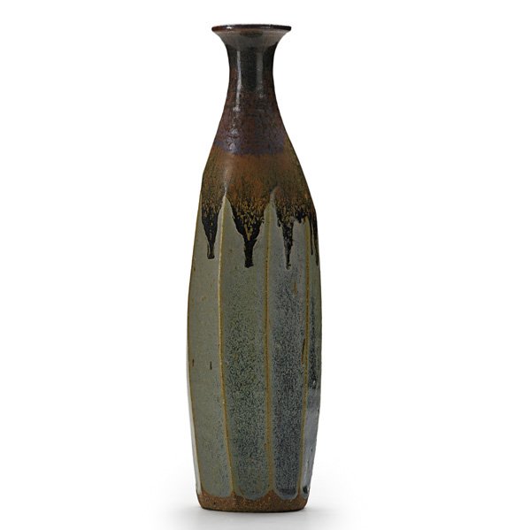 ANTONIO PRIETO: Faceted stoneware bottle with drip glaze, California; Signed; 14" x 4"
