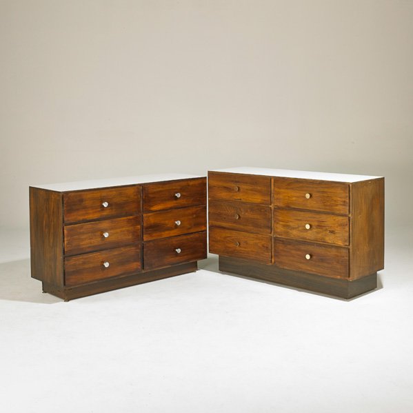 STYLE OF PAUL McCOBB: Two six-drawer dressers, USA, 1960s; Stained wood, laminate, matte chrome steel, brass; Unmarked; Larger: 30" x 48" x 16 1/2"