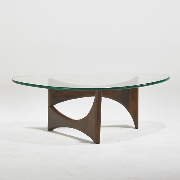 ADRIAN PEARSALL; CRAFT ASSOCIATES: Coffee table, Wilkes Barre, PA, 1960s; Sculpted walnut and glass; Unmarked; 14" x 45 1/2" x 34"