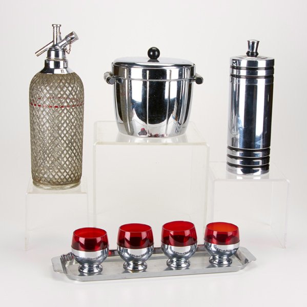 CHASE BARWARE; ETC.: Eight chromed metal, Bakelite pieces, USA and Czech Republic, 1930s: "Gaiety" cocktail shaker and four roly-poly cups by Chase Brass & Copper Co., ice bucket by Manning-Bowman & Co. and Czechoslovakia
