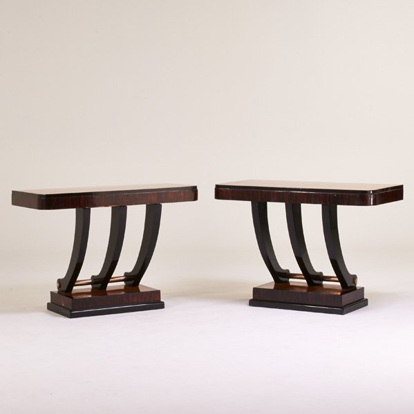 AMERICAN ART DECO: Pair of console tables, 1920s; Maple, polychromed and ebonized wood, nickeled brass; Each: 30" x 40 1/2" x 21 1/2"