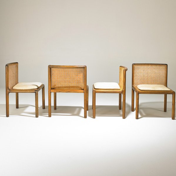 PHILLIP ENFIELD: Set of four side chairs, New York, 1960s; Stained oak, woven wicker, upholstery; Unmarked; 32" x 24" x 23"; Provenance: collection of Elizabeth Enfield