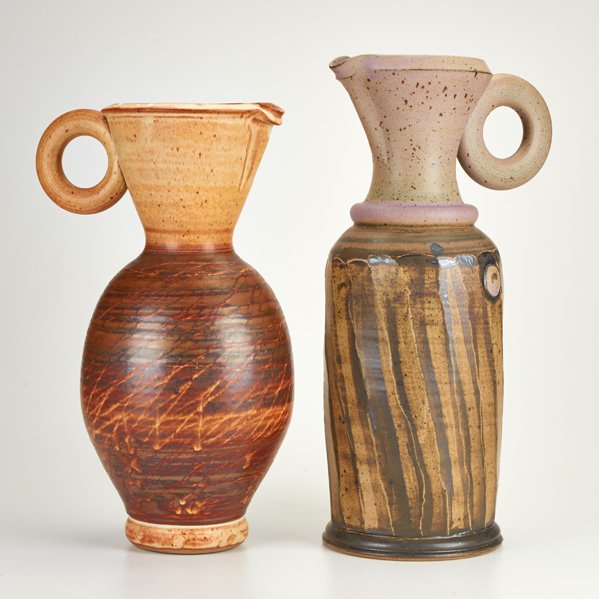 VAL CUSHING: Two massive stoneware ewers, Alfred, NY, mid- to late-20th c.; One signed "Val Cushing / Alfred," one unmarked; Taller: 21"