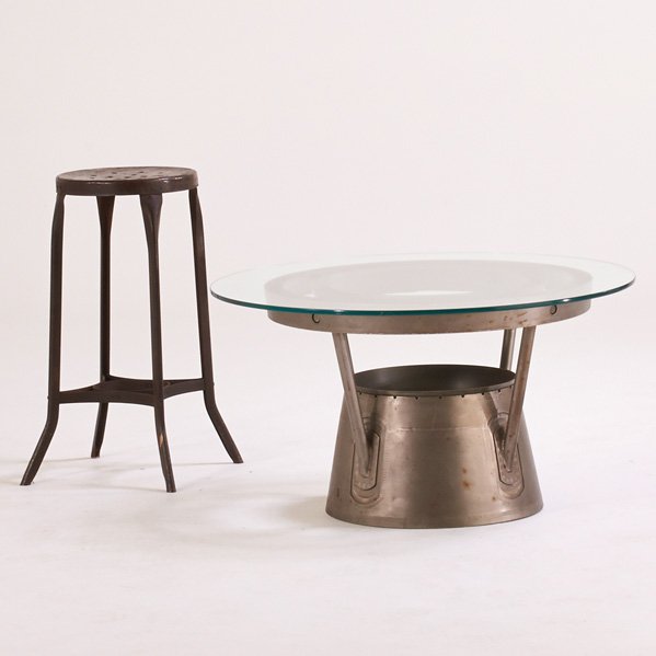 INDUSTRIAL: Coffee table made of re-purposed 50s jet engine housing and stool, USA, 1950s/1930s; Enameled metal; Coffee table: 15" x 33 1/2" dia., stool: 25" x 14" sq.