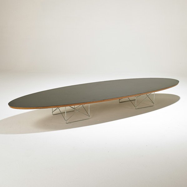 CHARLES AND RAY EAMES; HERMAN MILLER: Surfboard coffee table (ETR), USA, 1960s; Laminated plywood, zinc-plated steel; Metal label; 10" x 89" x 29 1/2"
