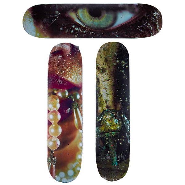 MARILYN A. MINTER (American, b. 1948): Three transfer-printed Supreme skateboard decks in original cellophane wrappers; "Pearly," "Eye," "Shitkicker"; Stamped signature; Each: 31" x 7 7/8"