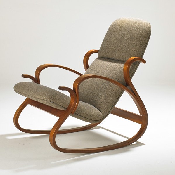 PETER DANKO: Rocking chair, USA, 1981; Bent walnut, Knoll wool upholstery; Incised signature; 38" x 27" x 35"