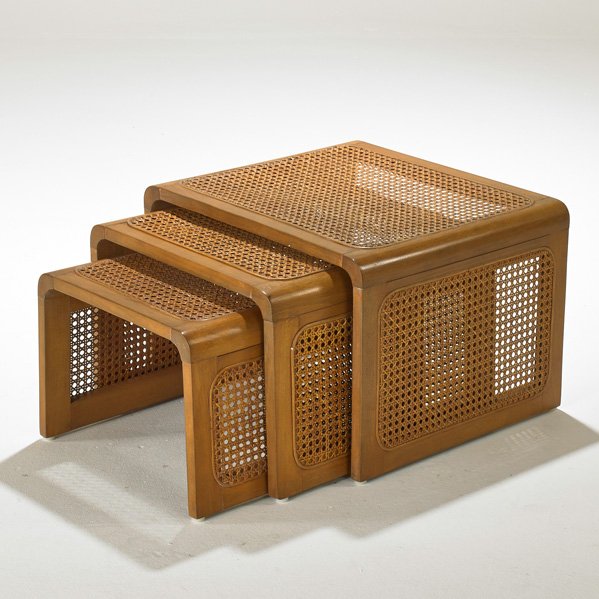 EUROPEAN: Set of nesting tables, 1960s; Stained and lacquered beech, cane; Unmarked; 13 1/2" x 20" x 17 1/2"