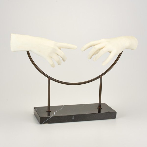 AMILCARE SANTINI: Alabaster sculpture of two hands mounted on marble base, Italy, mid-20th c.; Sticker label; 14" x 22" x 5 1/2"