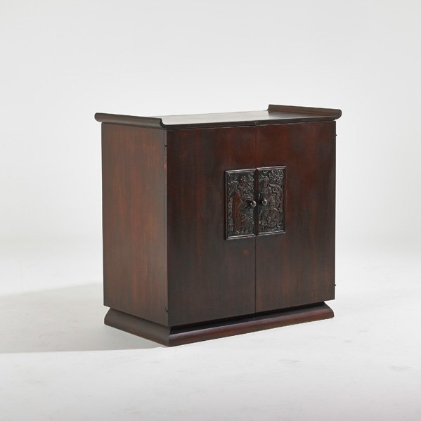 JAMES MONT / STROMBERG CARLSON: Stereo cabinet in stained and lacquered mahogany finish with Chinese-motif embossed panels; Fitted with Stromberg Carlson stereo; Stromberg Carlson metal tag; 35" x 39 1/2" x 19 1/4"