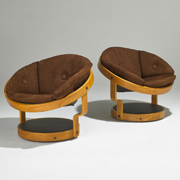 THONET: Pair of swivel lounge chairs, Austria, 1960s; Oak, suede; Fabric labels; Each: 28" x 32 1/2" dia.