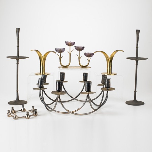 YSTAD-METALL, ETC.: Seven pieces, Sweden, Denmark, 20th c.; Includes pair of brass candlesticks by Ivar Alenius Bjoerk for Ystad-Metall, pair of iron candlesticks by Jens Quistgaard for Dansk, Ystad-Metall candelabrum, e