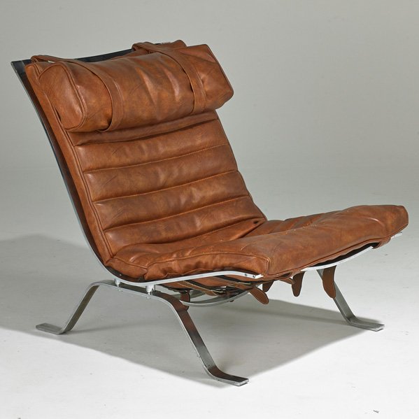 ARNE NORRELL: Ari lounge chair, Denmark, 1970s; Chromed steel, leather straps and vinyl upholstery; Unmarked; 31" x 26" x 35"