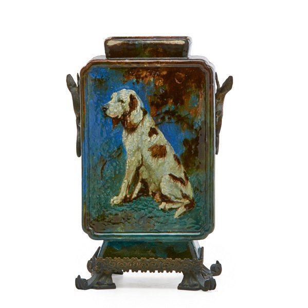 GIEN Vase w/ spaniel: GIEN Large vase painted in barbotine with spaniel in landscape, applied metal salamander handles and base, France, 1880s; Artist's signature to body, illegible markings to base; 16" x 11" x 8"