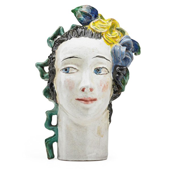 LOTTE CALM; WIENER WERKSTATTE Ceramic head: LOTTE CALM (b. 1897) WIENER WERKSTATTE Glazed ceramic head, Austria, 1920s; Stamped WW MADE IN AUSTRIA 960; 8 3/4" x 5 1/2" x 5" Literature: Fahr-Becker, Wiener Werkstatte 1903-1952, 1995, plate 151