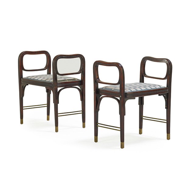 JOSEF HOFFMANN; J & J KOHN Pair of benches: JOSEF HOFFMANN (1870 - 1956) J & J KOHN Pair of benches, 1900s; Stained and lacquered beech, brass, upholstery; Remnants of paper label to each, ink stamped; 26" x 21 1/2" x 12 1/2"