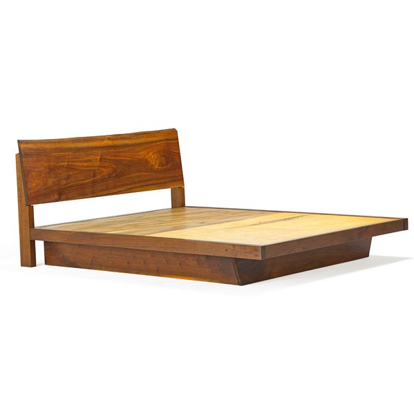 GEORGE NAKASHIMA Double bed: GEORGE NAKASHIMA (1905 - 1990) NAKASHIMA STUDIOS Double Conoid bed, New Hope, PA, 1973; Walnut, birch plywood; Unmarked; 33" x 79 3/4" x 60", platform: 75 1/2" x 60" Provenance available: Copy of orig
