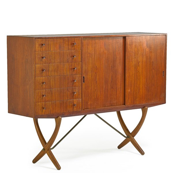 HANS WEGNER; JOHANNES HANSEN Cabinet: HANS WEGNER (1914 - 2007) CARL HANSEN & SON Cabinet, Denmark, 1950s; Teak, white oak, brass; Branded; 49 3/4" x 66" x 17 3/4" Provenance: Original owner