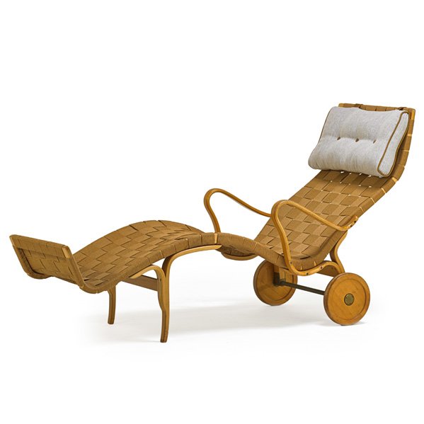 BRUNO MATHSSON Rare Pernilla long chair: BRUNO MATHSSON (1907 - 1988) FIRMA KARL MATHSSON Rare Pernilla long chair on wheels, Sweden, 1940s; Laminated beech, canvas, brass, leather; Branded; 35 3/4" x 25" x 67" Provenance: Wright, November 2