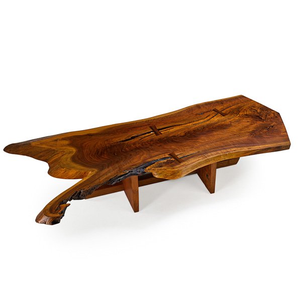 GEORGE NAKASHIMA Fine Minguren I coffee table: GEORGE NAKASHIMA (1905 - 1990) NAKASHIMA STUDIOS Fine Minguren I coffee table, New Hope, PA, 1975; Figured walnut, rosewood; Unmarked; 15 1/2" x 77 1/2" x 32" Provenance available: Copy of original or