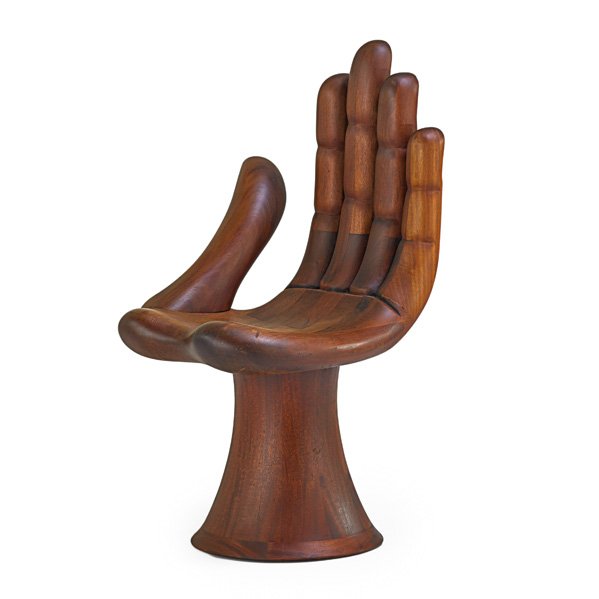 PEDRO FRIEDEBERG Hand chair: PEDRO FRIEDEBERG (b. 1937) Hand chair, Mexico, 1960s; Laminated and carved Mexican mahogany; Unmarked; 34 1/2" x 19" x 21 1/2" Note: Complete with certificate of authenticity
