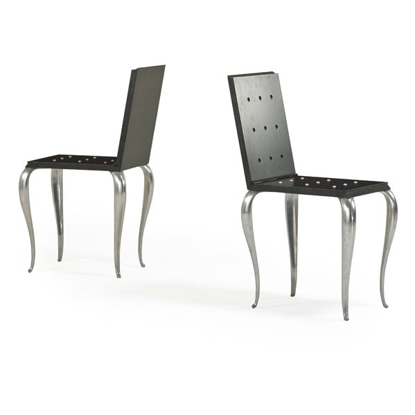 PHILIPPE STARCK; Pair of Lola Mundo chairs: PHILIPPE STARCK (b. 1949) DRIADE Pair of Lola Mundo chairs, France/Italy, 1980s; Mahogany, cast aluminum, rubber; Unmarked; 19 1/4" x 18" x 13 1/2"