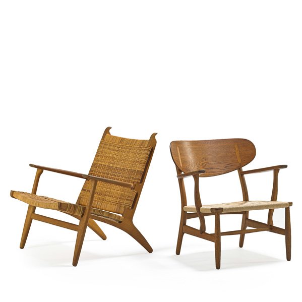 HANS WEGNER Two lounge chairs: HANS WEGNER (1914 - 2007) JOHANNES HANSEN CARL HANSEN & SON Two lounge chairs, one manufactured by Johannes Hansen and the other by Carl Hansen ("Easy Chair #27"), Denmark, 1960s; Oak, cane, paper cor