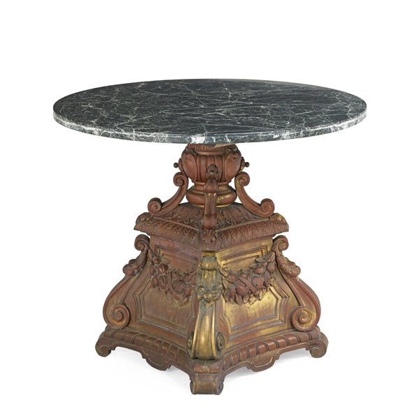 MARBLE TOP OCCASIONAL TABLE: Parcel-gilt metal base with foliate decoration, early 20th c.; 29" x 42" dia.
