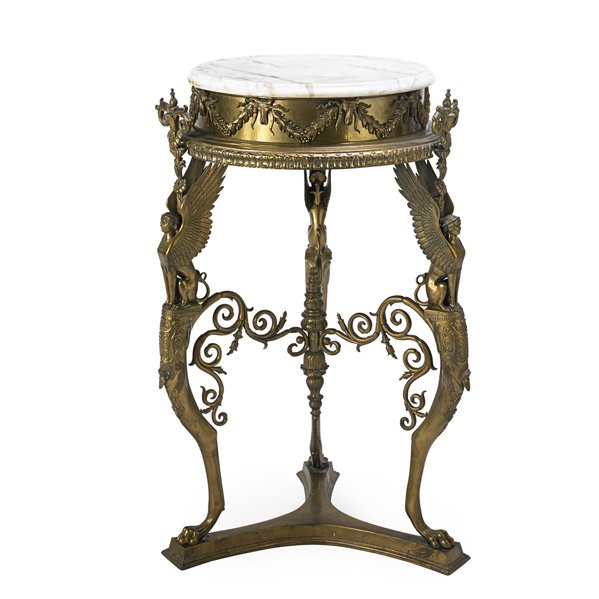 NEOCLASSICAL MARBLE TOP TABLE: Brass base with griffins, ca. 1900; 37" x 24" dia.