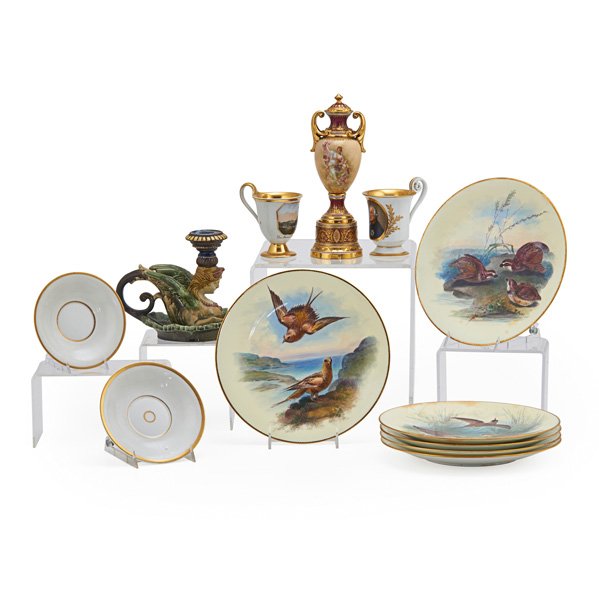 MINTON / KPM: Twelve items, 19th/20th c.: six Minton hand-painted bird plates and two KPM cups and saucers together with a Vienna covered urn and majolica candlestick; Urn: 9 1/2"