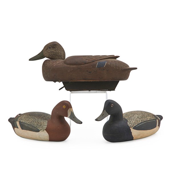 AMERICAN DUCK DECOYS: Three, 20th c.: pair of Blue Bills by G. Burkley, Bordentown, NJ and Gilbert Hen Mallard; Largest: 15"