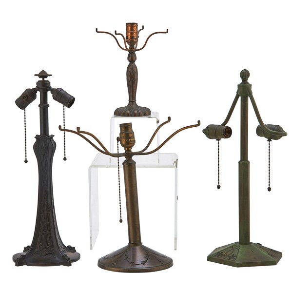 BRADLEY & HUBBARD/PAIRPOINT: Four metal lamp bases, early 20th c.: three Bradley & Hubbard and one Pairpoint; Tallest: 20"