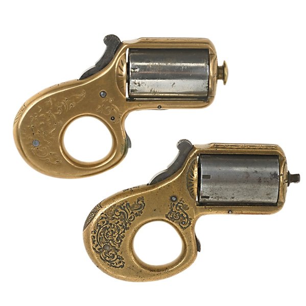JAMES REID PEPPERBOXES: Two 22 caliber "My Friend" Knuckle Dusters with brass frames and steel barrels, serial nos. 15485 and 15045, ca. 1867; Both marked; 4"