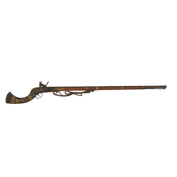 MIDDLE EASTERN FLINTLOCK RIFLE: Applied brass ornaments, early 19th c.; Lock marked for East India Trading Company; Barrel: 43 1/2, overall: 57 1/2"