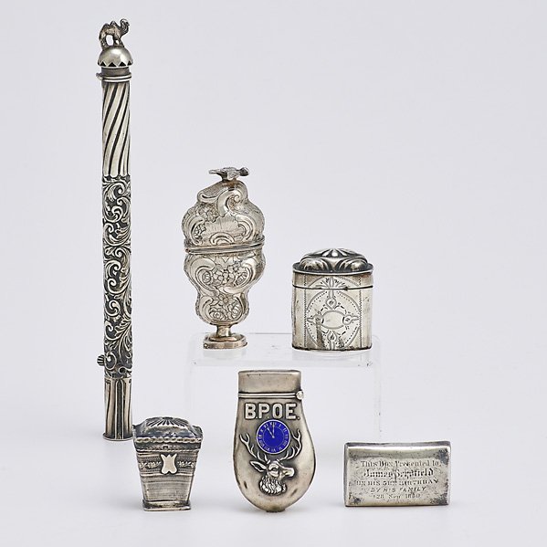 SILVER MATCH SAFES, SNUFF BOXES, CHEROOT CASE: Six pieces; English silver cigar case with camel finial and match safe, Grey & Co., London, 1899, 8 1/2"; Three antique continental silver snuff boxes; Georgian silver arched snuff box with later insc