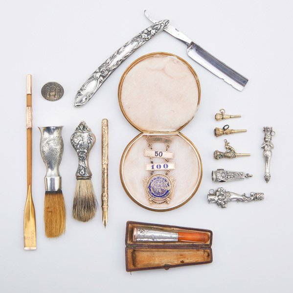 ANTIQUE GOLD, SILVER AND OTHER ACCESSORIES: 14 pieces total; Mexican Colonial silver button, 1744; Gold-mounted Japanesque silver cigar holder with applied spider in web, amber stem, case, 3 1/8"; Chased 14k gold mechanical pen/pencil, 4 3/4"; 