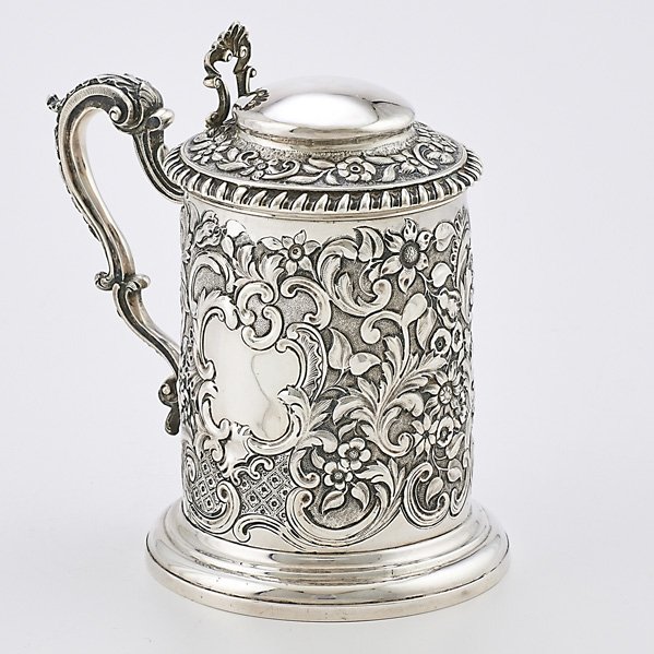 GEORGE IV SILVER TANKARD: Cylindrical with dome lid and serpentine handle decorated with floral rocquille on stippled or quilted ground, James Collins, London 1831; 8 3/8"; 30.43 OT