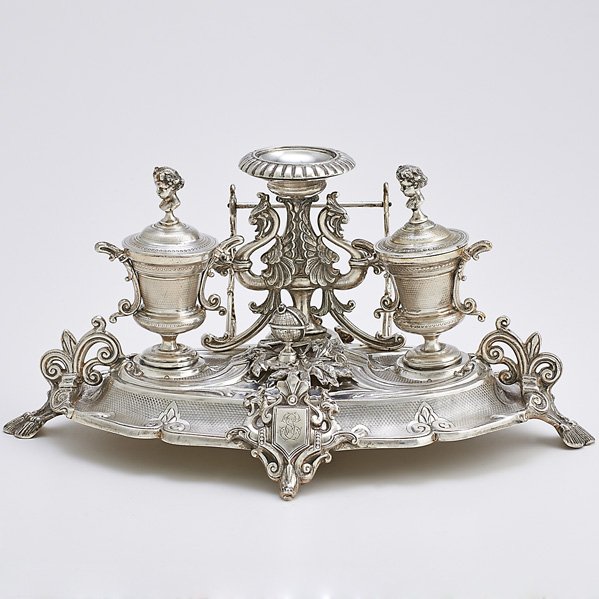 NAPOLEON III 950 SILVER DESK STANDISH: With griffon and globe ornament, engine-turned ground, cherub bust finials, presented to Edward Peace by descendants of Agustin De Iturbide, Emperor of Mexico, Fizaine, Paris, 1858-1866; 15"; 35.7 OT