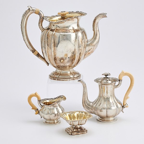RUSSIAN 84 SILVER HOLLOWARE: Four pieces; Vertically fluted with ivory handles or insulators, some gilt interiors: Coffee pot with oyster shell finial, St. Petersburg, 1840, assayer Dmitri Tvyersko, 8 7/8"; Bachelor's coffee pot 