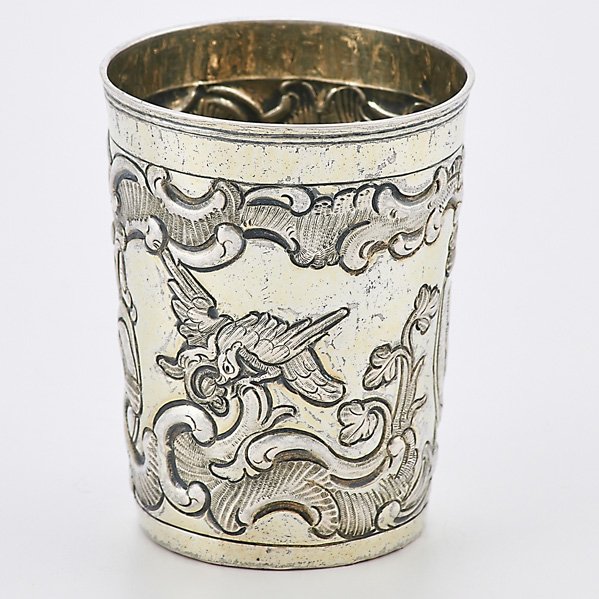 18TH C. RUSSIAN GILT SILVER BEAKER: Taped cylindrical form chased with eagles on branches, rocquille ribbons, Kiev, 1774; Assayer Ivan Savelyev, marked for Fyedor Petrov, Moscow and other unrecognized marks; 3 Â½â€; 3 OT
