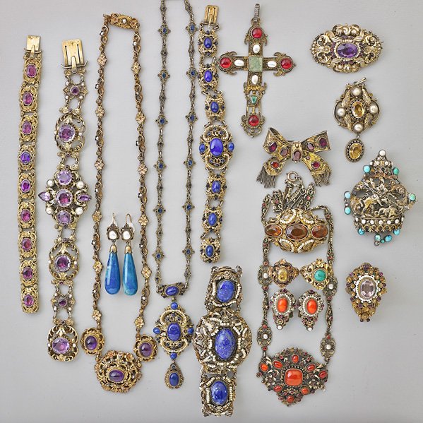 RENAISSANCE REVIVAL SILVER JEWELRY COLLECTION: 20 items with garnet, coral, lapis, turquoise, amethyst, citrine or glass: Four necklaces; Crucifix with green beryls and pearls; Two pairs earrings; Two rings; Three brooches; Four bracelets; Saint G