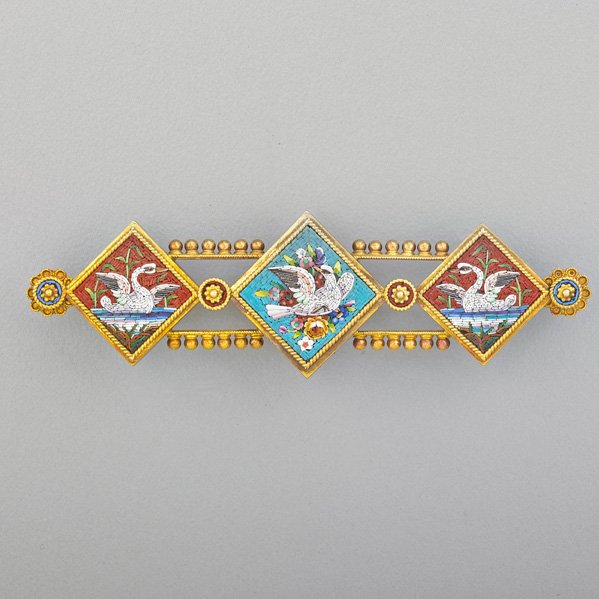 VICTORIAN MICROMOSAIC 18K GOLD BROOCH: Three fine polished panels depict swans swimming and a dove separated by rosettes, granulated bar with coil cut wire, glazed chamber obverse. 2 1/2" x 3/4". 7.6 dwt.