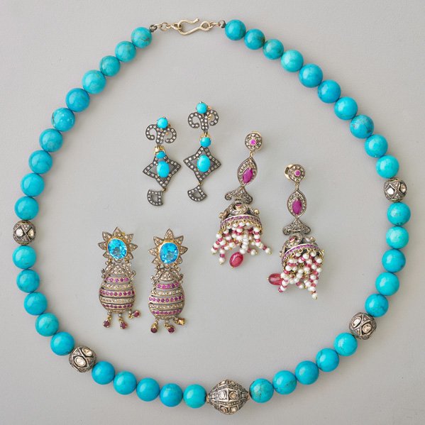 RECENT INDIAN DIAMOND JEWELRY, SEVEN PIECES: 21 1/2" turquoise bead necklace has five Kundan set diamond and silver beads; 2" turquoise and diamond pendant earrings silver and gold; 3" diamond and ruby tassel earrings with pearl and ruby fringe,