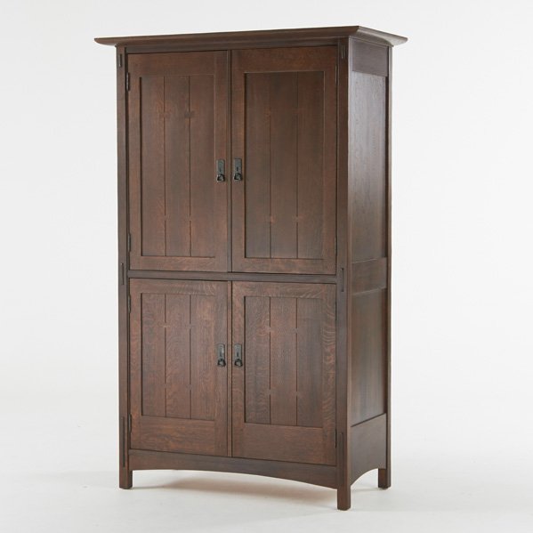 STICKLEY BY EJ AUDI: Media cabinet with fitted interior, Manlius, NY, 1990s; Quartersawn oak, patinated hardware; Round metal tag and branded; 78" x 48" x 24 1/2"