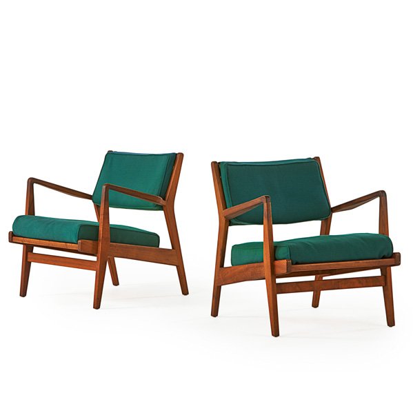 JENS RISOM DESIGN: Pair of lounge chairs with arms, USA, 1960s; Walnut, upholstery; Remnants of manufacturer labels; 30" x 27" x 33"