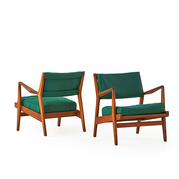 JENS RISOM DESIGN: Pair of lounge chairs with arms, USA, 1960s; Walnut, upholstery; Remnants of manufacturer labels; 30" x 27" x 33"