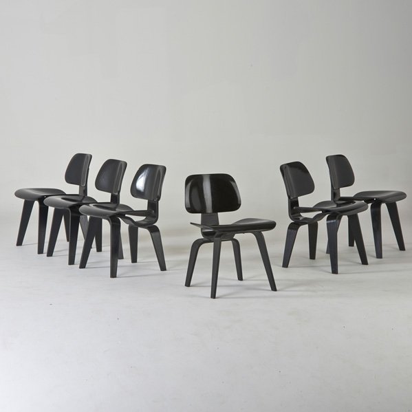 CHARLES AND RAY EAMES; HERMAN MILLER: Six dining chairs (DCW), USA, 1990s; Black enamel over wood; Painted over metal tags; Each: 28 1/2" x 19 1/2" x 22"