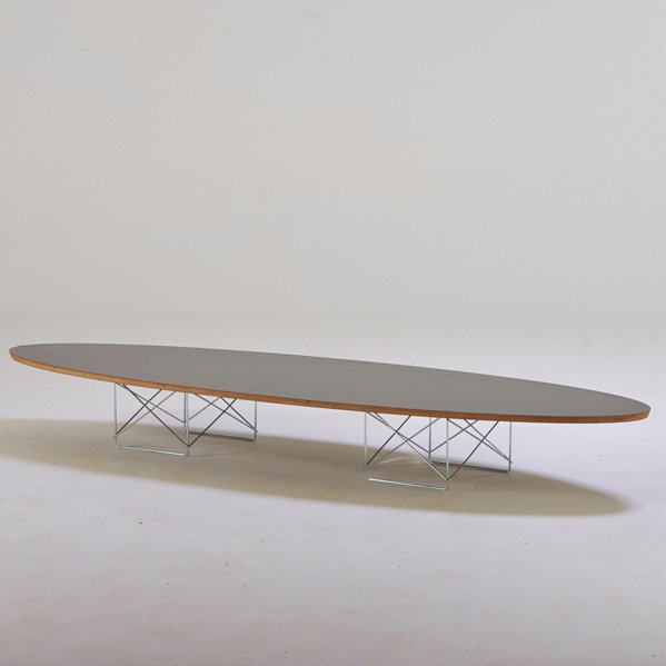 CHARLES AND RAY EAMES; HERMAN MILLER: Surfboard coffee table, Zeeland, MI, 1990s; Laminated plywood, zinc-plated steel; Metal label; 10" x 89" x 29"