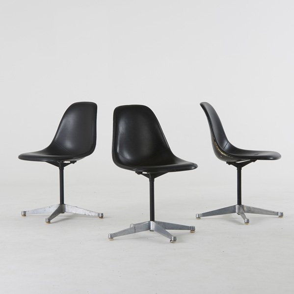 CHARLES AND RAY EAMES; HERMAN MILLER: Three side chairs, Zeeland, MI, 1960s; Plastic reinforced fiberglass, enameled steel, aluminum, vinyl; Manufacturer labels; 31 1/2" x 19" x 22"